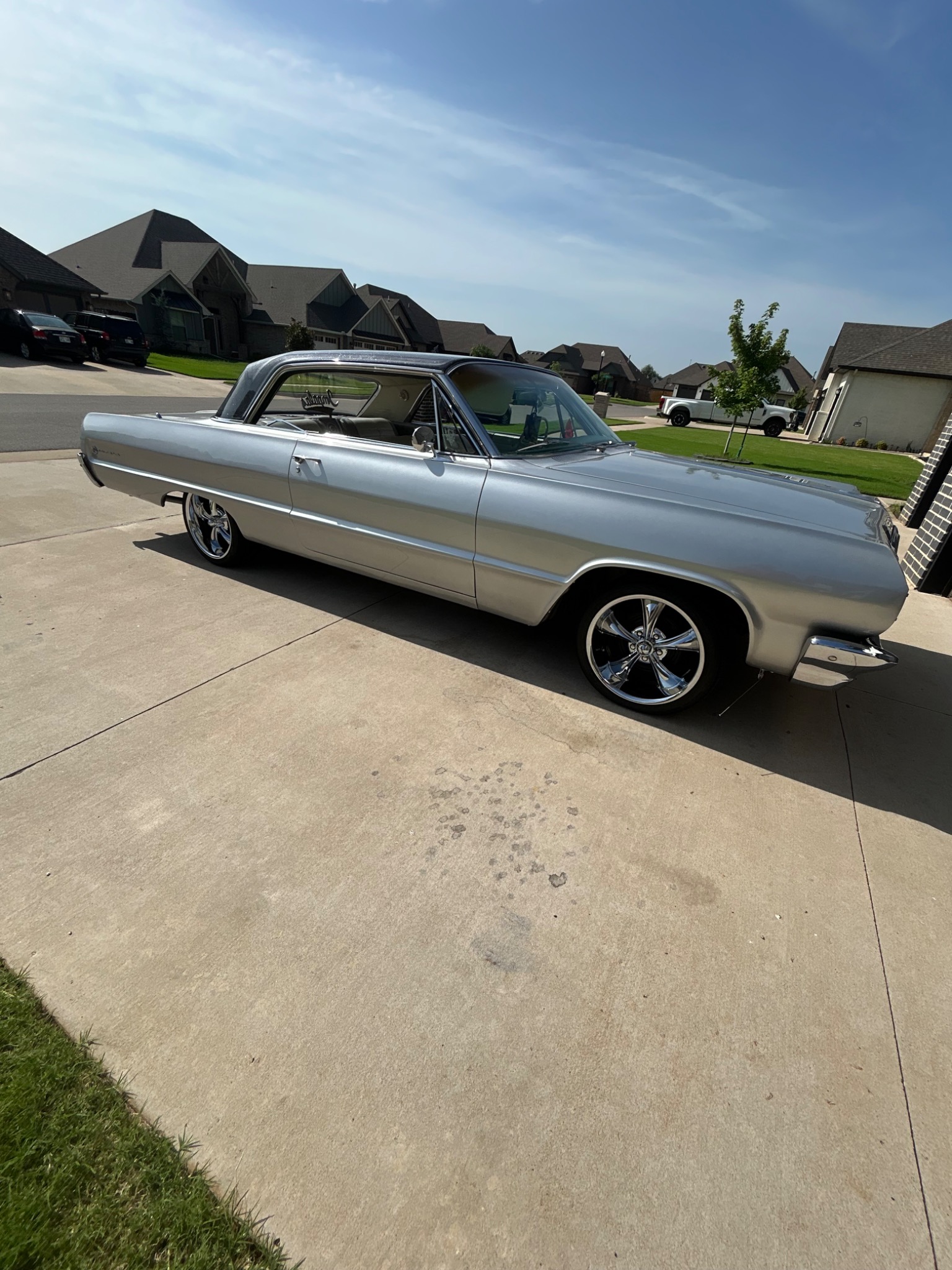 Silver classic Chevrolet Impala cleaned by PoliShine